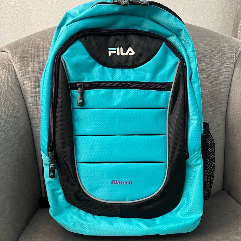 NWOT Fila tech backpack! Turquoise and purple. Multiple zipped compartments!